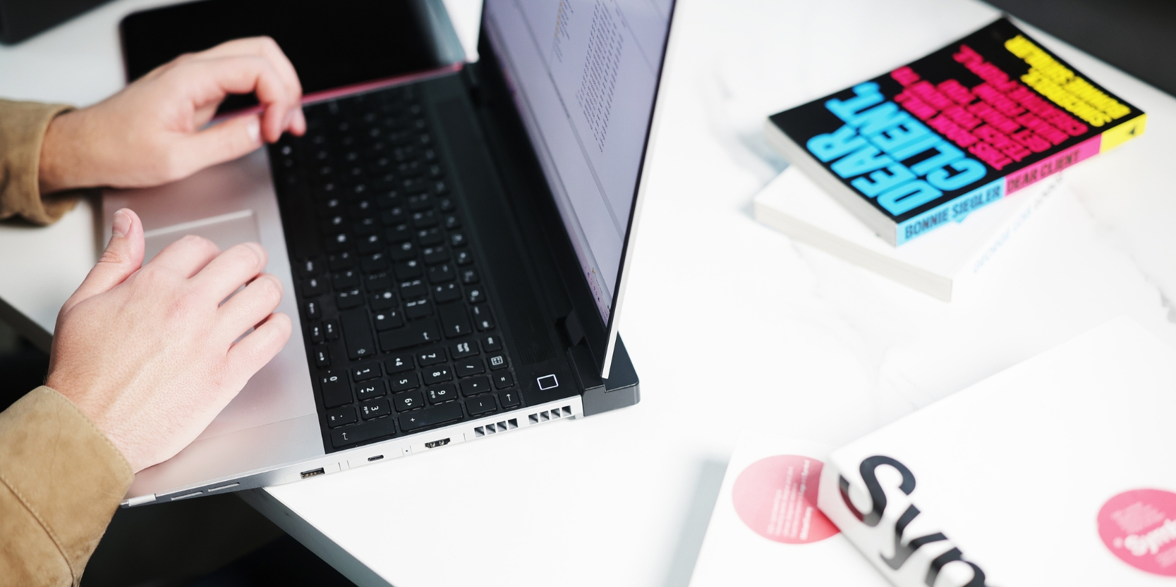 Team using custom software to replace business spreadsheets and improve productivity in the UK